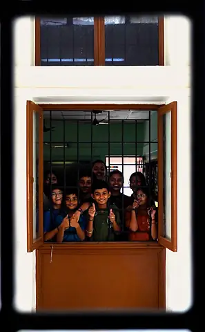 Children looking out of a window