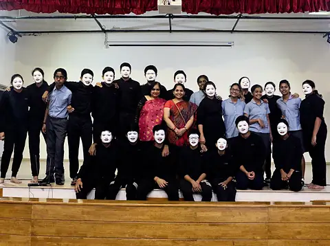 Mime, in white masks