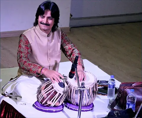 A visiting tabla player