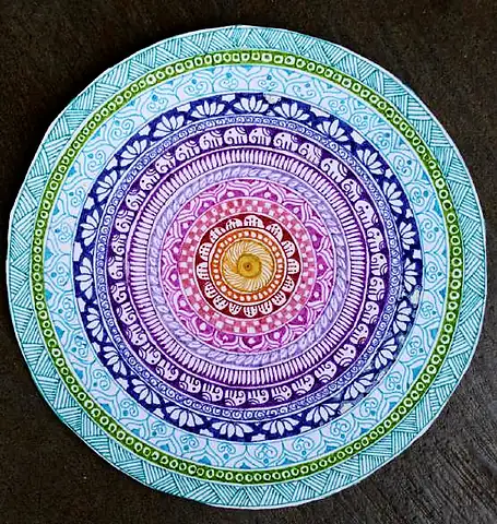 A round mandala in blues, purples and pinks
The Crossroads, Issue 31 · May 2026