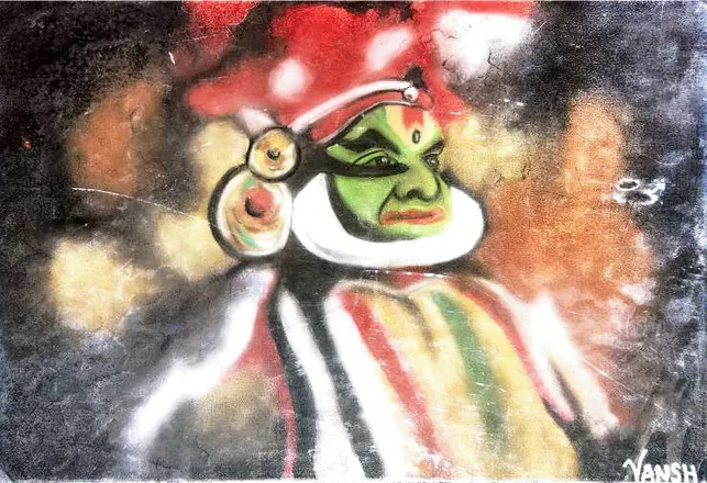 A Kathakali face in green and red, blurred with colour around it