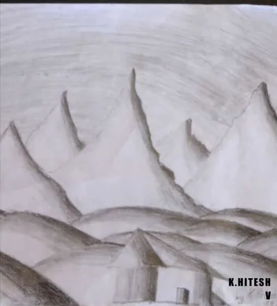 A range of pointed mountain peaks in grey