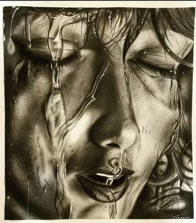 A woman's face with eyes closed and water running over it, in sepia greys