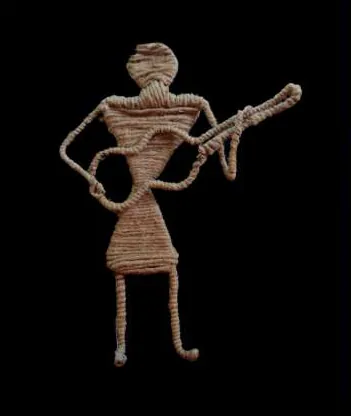 A figure playing a stringed instrument, made of wound brown cord, on black