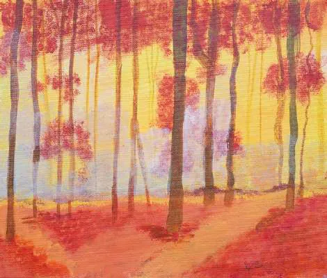 A forest of slender trunks in red and orange light