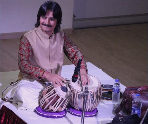 A visiting tabla player