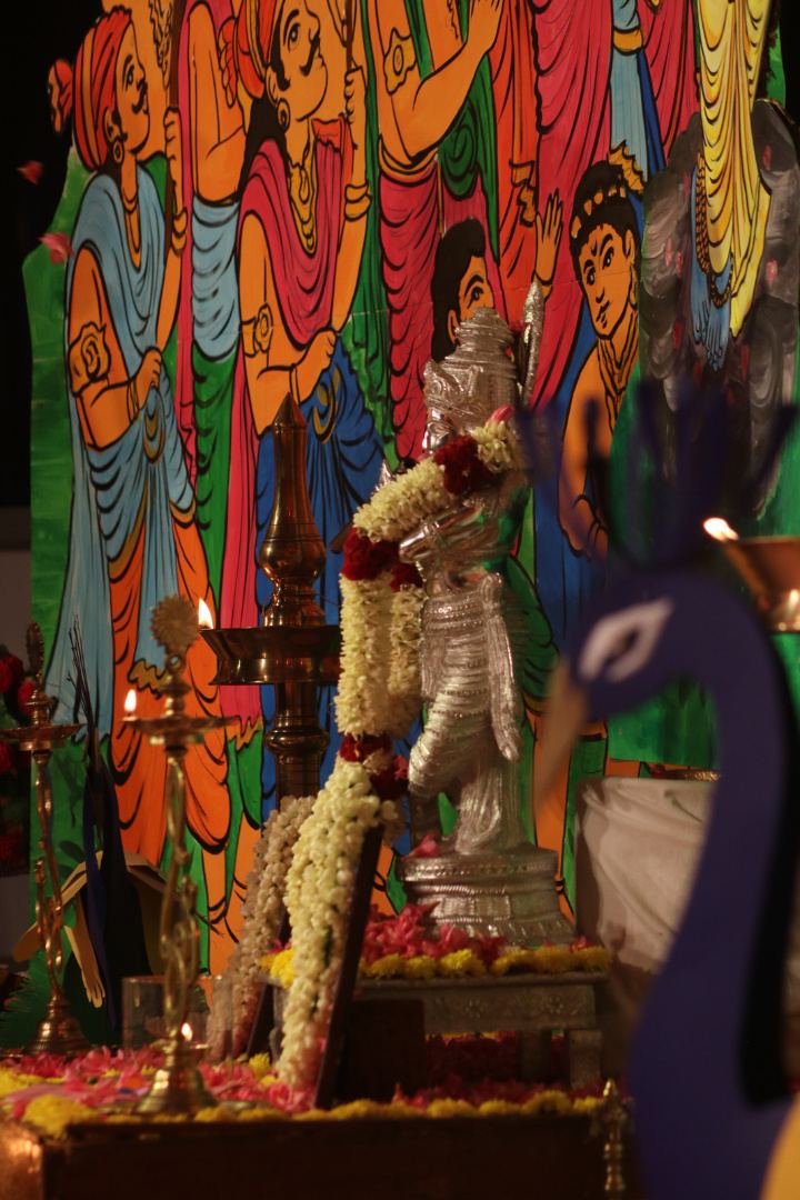 Flowers and artwork on a decorated stage