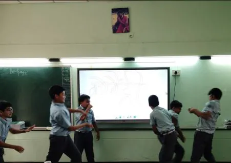 Grade 6 students performing a hockey commentary in a Hindi lesson