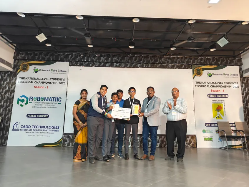CIRS students receiving their award on stage at the Universal Robo League Project Expo