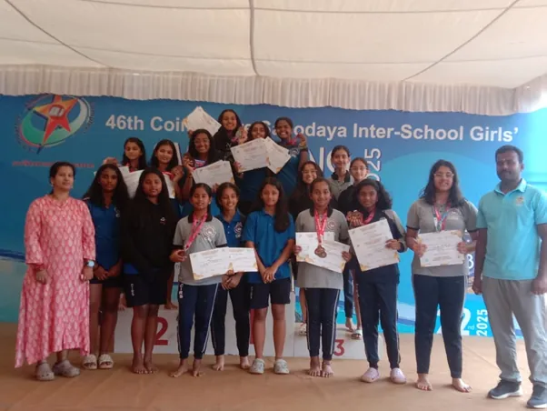 CIRS girls' swimming team with their certificates at the 46th Coimbatore Sahodaya meet