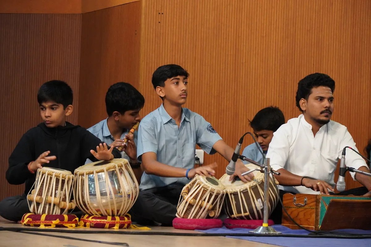 Students accompanying on tabla at the Vasant Panchami music workshop
