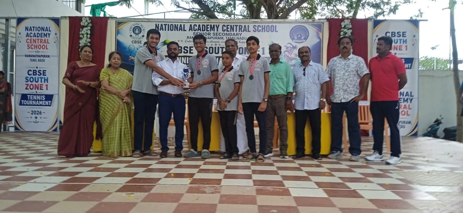 Players and officials standing together after the CBSE South Zone Tennis Tournament